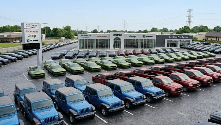 A dealer lot packed with rows of the same models in the same colors — aging, hard-to-move new-vehicle inventory